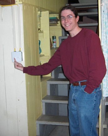 light switch at the bottom of the stairs
